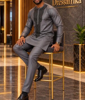 A Man Wearing A Charcoal Grey Embroidered Long-Sleeve Senator Tunic & Pants Set.