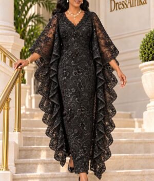 A Woman Wearing A Black 3D French Lace Boubou Kaftan With A Bridal Satin Inner Gown.