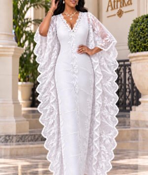 A Woman Wearing A Luxury White French Lace Boubou Kaftan With A Bridal Satin Inner Gown.