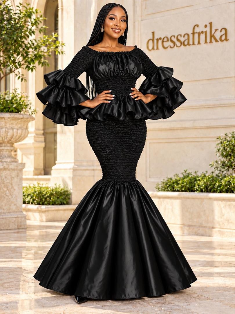 Luminous Onyx Black Smocked Peplum Ruffle Mermaid Gown. 2 A Woman Wearing A Luminous Onyx Black Smocked Peplum Ruffle Mermaid Gown.