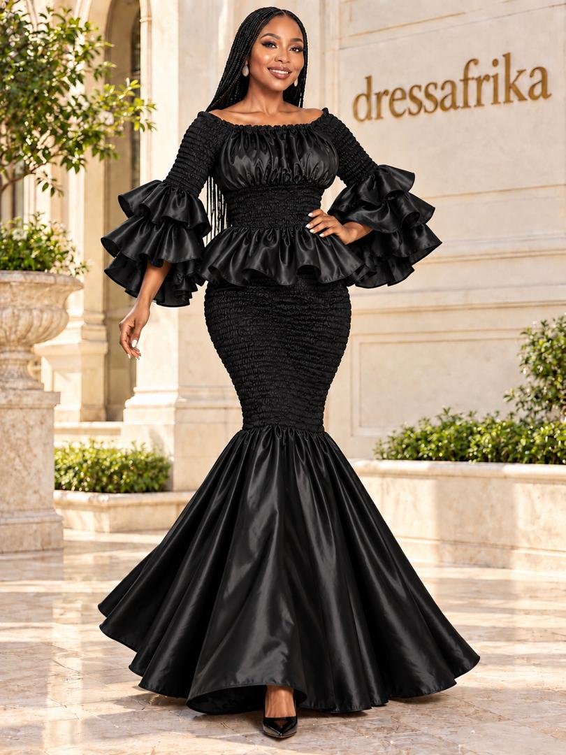 Luminous Onyx Black Smocked Peplum Ruffle Mermaid Gown. 3 A Woman Wearing A Luminous Onyx Black Smocked Peplum Ruffle Mermaid Gown.