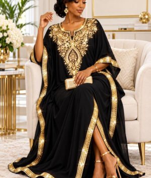 A Woman Wearing A Flory Midnight Onyx Black Silk Boubou Kaftan & Gold Crystal Medallion Gown With Full Length 58 Inches.