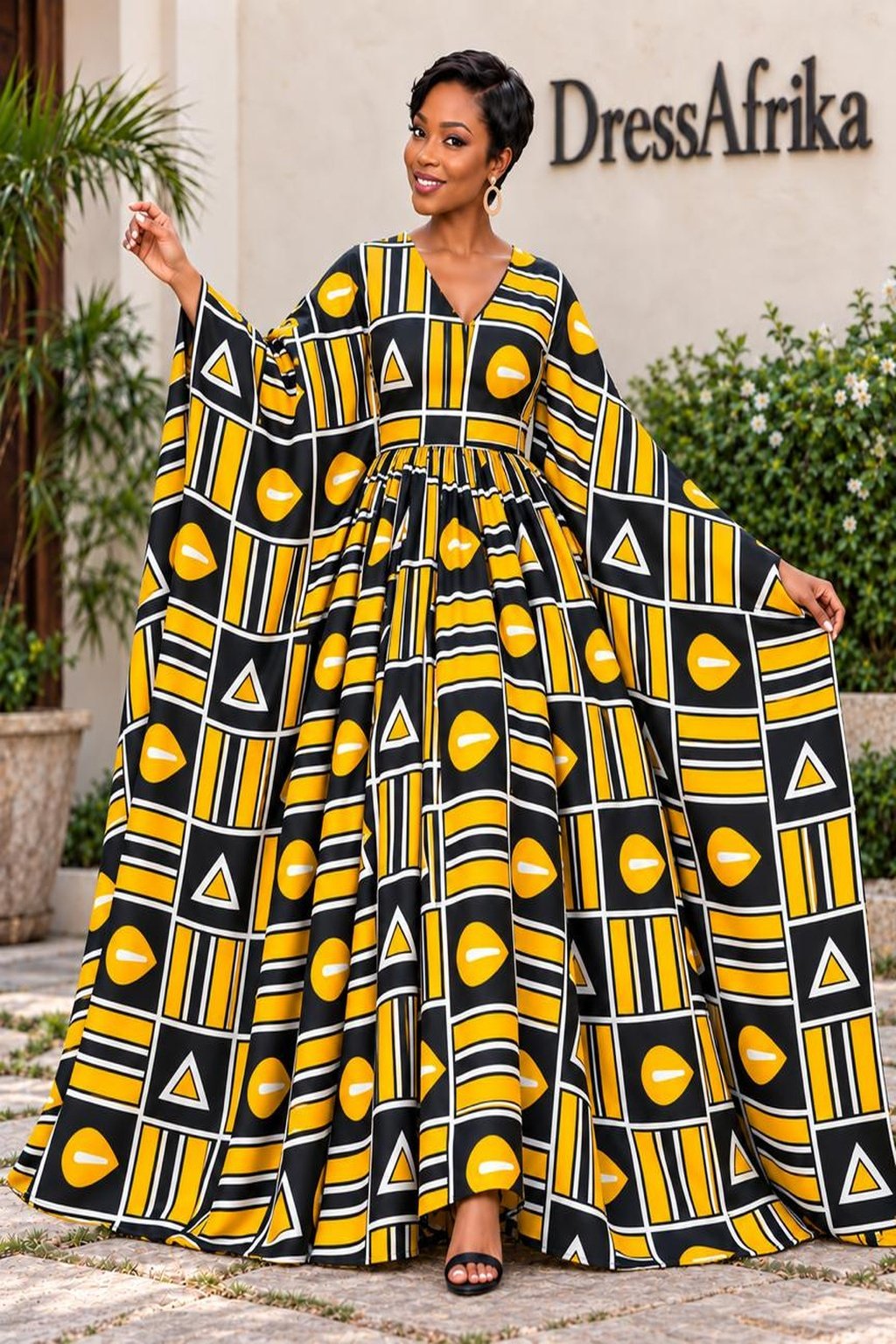 A Woman Wearing A Luxury Marigold Geometric Ankara Print Inner Tie Maxi Boubou Dress.