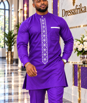 A Man Wearing A Royal Purple & Alabaster Geometric Embroidered Long-Sleeve Senator Tunic And Pants Set.